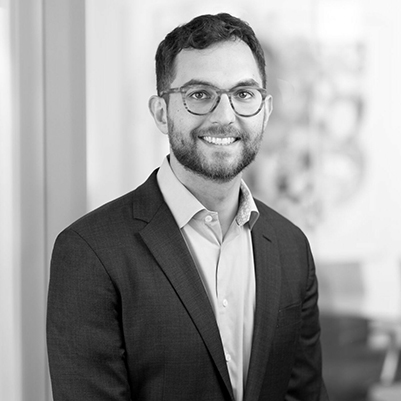 Headshot of Jacob Canter, greyscale